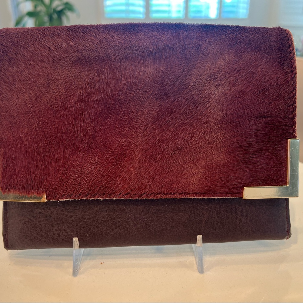 14. Burgundy Clutch